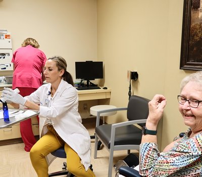 Jen Getting Supplies with Patient