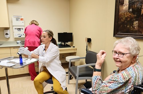 Jen Getting Supplies with Patient