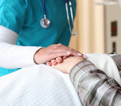 Nursing Hands with Patient Hands