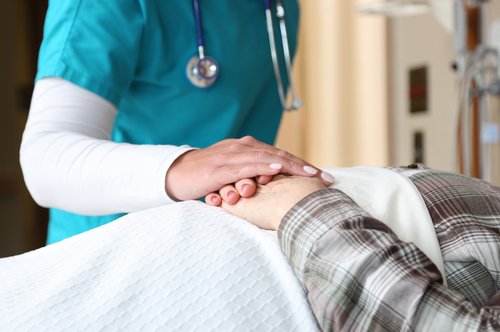 Nursing Hands with Patient Hands